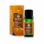 Frasco do óleo essencial de anis estrelado com embalagem ao lado.